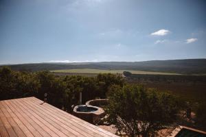 a view of a roof with a pond on top at Solace Eco Cabins - Citrus Cabin in Clanwilliam