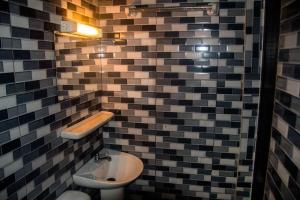 Koupelna v ubytování Le Petit Manoir