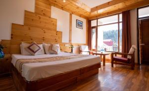 A bed or beds in a room at THE CONIFER