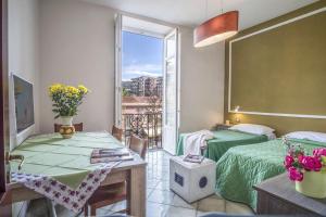 A bed or beds in a room at Amore Rentals - Appartamento Caruso