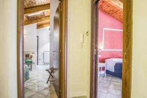 A bed or beds in a room at Amore Rentals - Appartamento Caruso