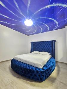 เตียงในห้องที่ Blue Apartament Braila