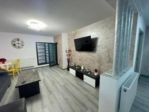 Μια τηλεόραση ή/και κέντρο ψυχαγωγίας στο D&D New Residence
