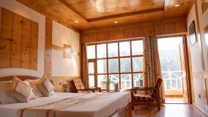 A bed or beds in a room at THE CONIFER