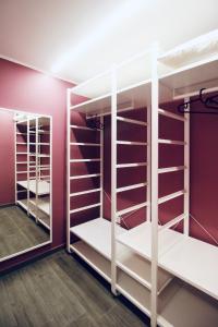 Palanda nebo palandy na pokoji v ubytování B&B Butterfly Suite