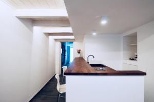 Kuchyň nebo kuchyňský kout v ubytování B&B Butterfly Suite