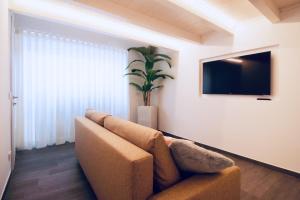 TV a/nebo společenská místnost v ubytování B&B Butterfly Suite