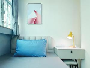 Tempat tidur dalam kamar di Student Accommodation - 26 Man Yuen Street