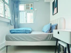 Tempat tidur dalam kamar di Student Accommodation - 26 Man Yuen Street