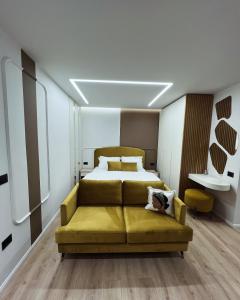 Llit o llits en una habitació de Alesia Hospitality