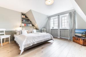 Ein Bett oder Betten in einem Zimmer der Unterkunft Ahoi