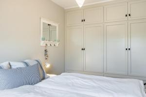 Ein Bett oder Betten in einem Zimmer der Unterkunft Ahoi