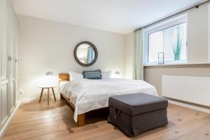 Ein Bett oder Betten in einem Zimmer der Unterkunft Ahoi