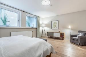 Ein Bett oder Betten in einem Zimmer der Unterkunft Ahoi