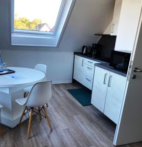 Kuchyň nebo kuchyňský kout v ubytování Gästehaus Blauth