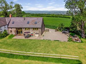 an aerial view of a house with a large yard at 4 Bed in Talgarth BN182 in Talgarth