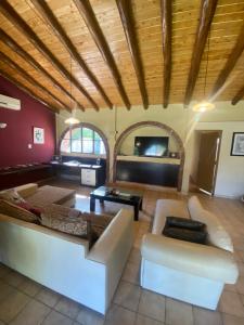 a living room with a couch and a table at Chalet San Rafael in San Rafael