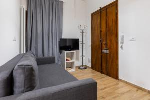 A television and/or entertainment centre at Bologna Suite Centre City