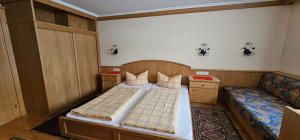 Letto o letti in una camera di Hotel-Garni Pramstraller