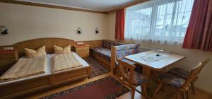 Letto o letti in una camera di Hotel-Garni Pramstraller