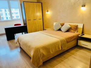 Katil atau katil-katil dalam bilik di Apartaments Sichovyh Strilciv 68a