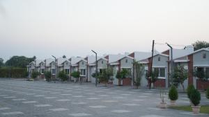 a row of houses in a parking lot at The Sky Imperial Sethji Ni Wadi in Indore