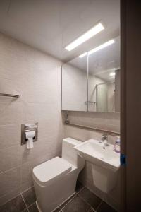 a bathroom with a toilet and a sink at Stay C Hotel Myeongdong in Seoul