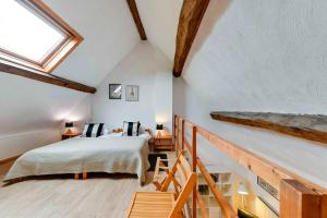 Postel nebo postele na pokoji v ubytování Au Gré des Vents - Gîtes et Chambres d'hôtes