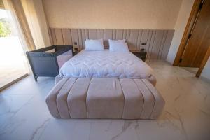 Un ou plusieurs lits dans un hébergement de l'établissement Villa Marrakech Urbane Luxe