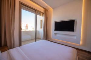Un ou plusieurs lits dans un hébergement de l'établissement Villa Marrakech Urbane Luxe