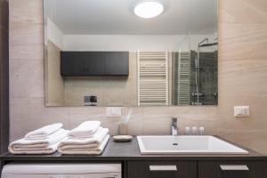 Koupelna v ubytování easyhomes - Spiga Suite