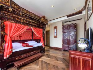 Un ou plusieurs lits dans un hébergement de l'établissement ChengDu Wuhou Temple Han Dynasty Hotel