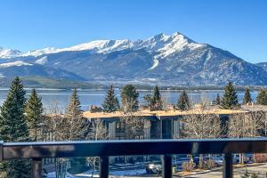 a view of a house with snow covered mountains at La Bonte Townhomes Unit 304 in Dillon