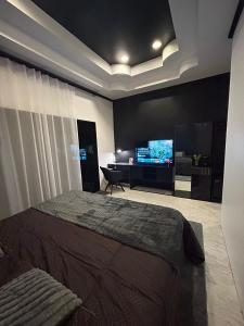 TV a/nebo společenská místnost v ubytování Hua Hin Oasis + 19 fotografií