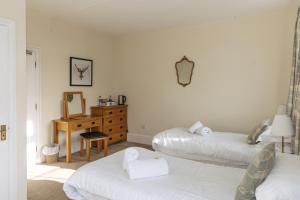 Postel nebo postele na pokoji v ubytování Horton Inn