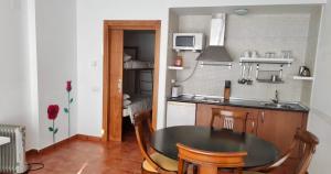 Kuchyňa alebo kuchynka v ubytovaní APARTAMENTOS SIERRA NEVADA VISTA SNOW