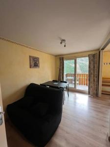 Χώρος καθιστικού στο Les terrasses d Isola B avec parking couvert inclus proche des pistes et de la galerie, résidence récente