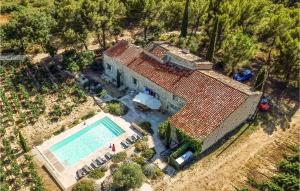 an aerial view of a house with a swimming pool at Stunning Home In Murviel-ls-bziers With 5 Bedrooms, Wifi And Outdoor Swimming Pool in Murviel