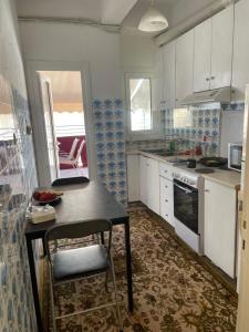 Køkken eller tekøkken på Acropolis view 3 shared room2 + 11 billeder