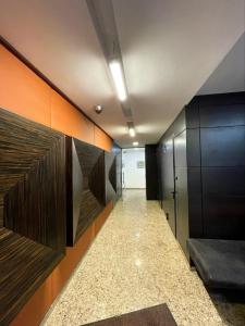 a hallway with wooden dividers in a building at Luxury Gated Apartment in Sofia