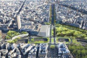 Una vista aérea de una ciudad con un edificio alto. en Porte MAILLOT, CHAMPS ÉLYSÉES, TRIOMPHE, suite 3 chambres 8P, en París