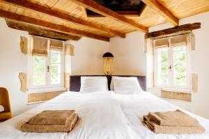 Posteľ alebo postele v izbe v ubytovaní Chateau Camp del Saltre Prayssac