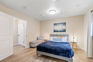 a bedroom with a bed and a chair in it at 1 Bedroom Apt near Santana Row, recently remodeled in San Jose
