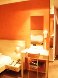 Posteľ alebo postele v izbe v ubytovaní Hotel Niki Piraeus