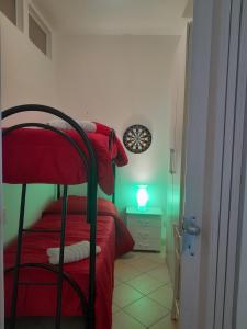 Postel nebo postele na pokoji v ubytování Sotto il Castello