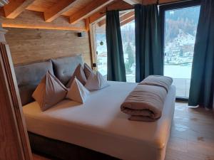 Posteľ alebo postele v izbe v ubytovaní Chalet Stubai