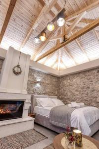Ένα ή περισσότερα κρεβάτια σε δωμάτιο στο Villa Ntora