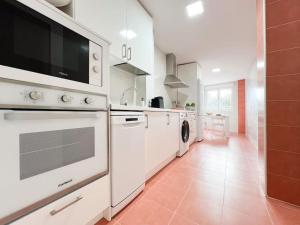 Dapur atau dapur kecil di Apartamentos Gredos 204