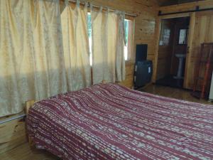 Ένα ή περισσότερα κρεβάτια σε δωμάτιο στο El Descanso