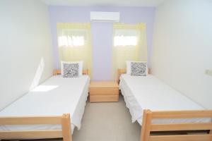 سرير أو أسرّة في غرفة في 138SL Short Term Rental